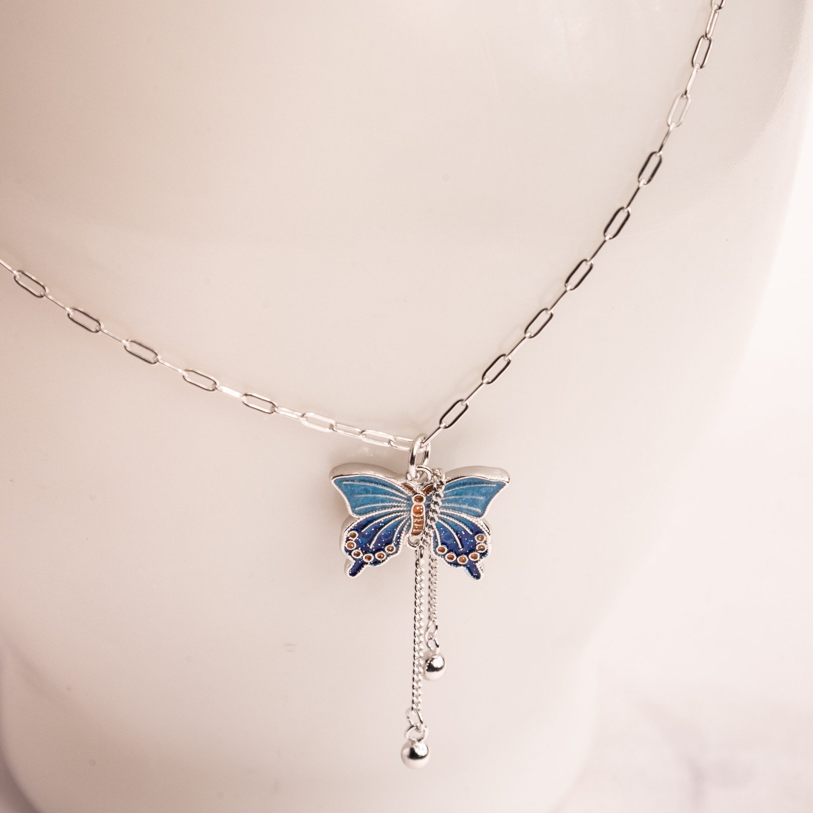 SN15 Blue Butterfly Necklace - Image 1